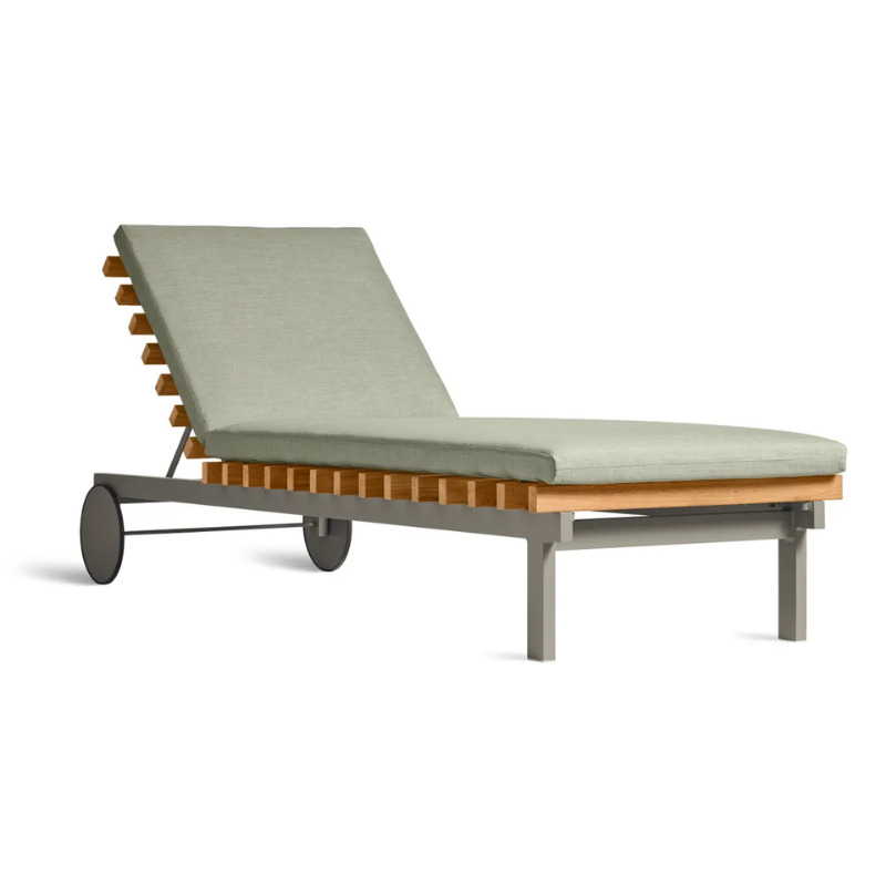 The Perch Outdoor Sun Lounger from Blu Dot with the carbon frame and sunbrella oasis upholstery.