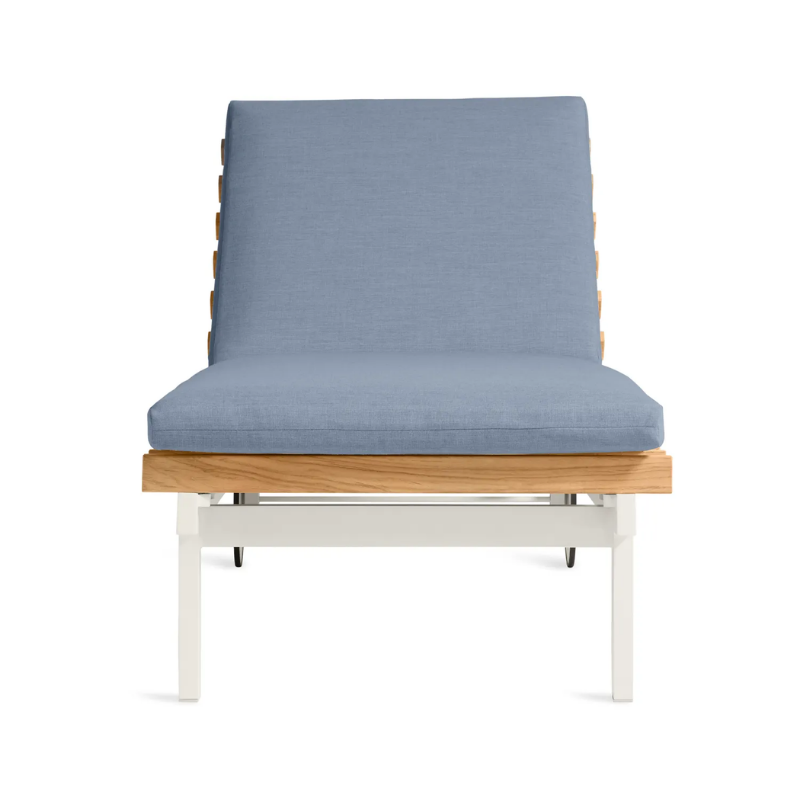 The Perch Outdoor Sun Lounger from Blu Dot with the white frame and sunbrella haze upholstery from the front.