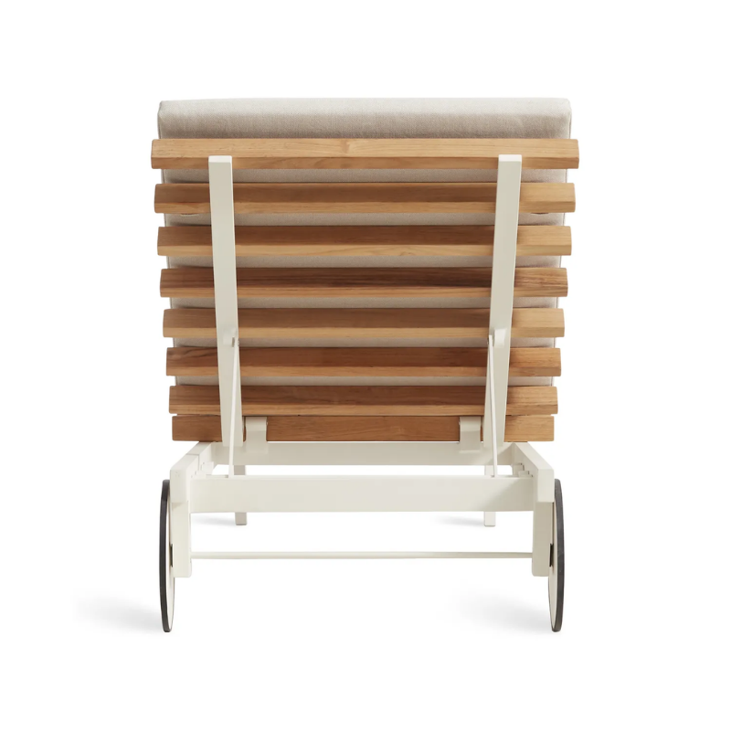 The Perch Outdoor Sun Lounger from Blu Dot with the white frame and sunbrella linen upholstery from the back.