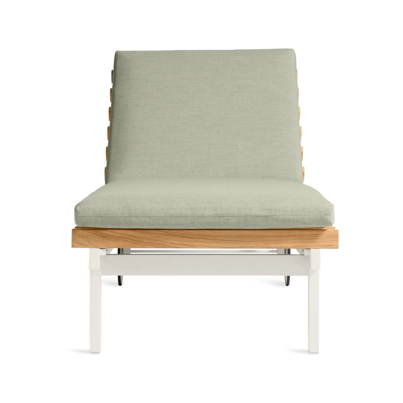 The Perch Outdoor Sun Lounger from Blu Dot with the white frame and sunbrella oasis upholstery from the front.