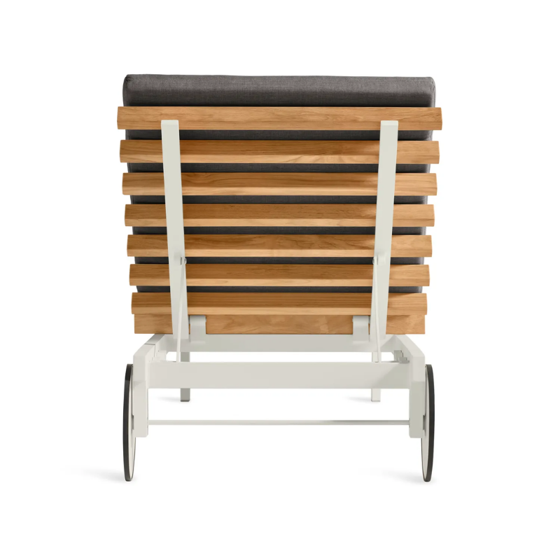 The Perch Outdoor Sun Lounger from Blu Dot with the white frame and toohey charcoal upholstery from the back.