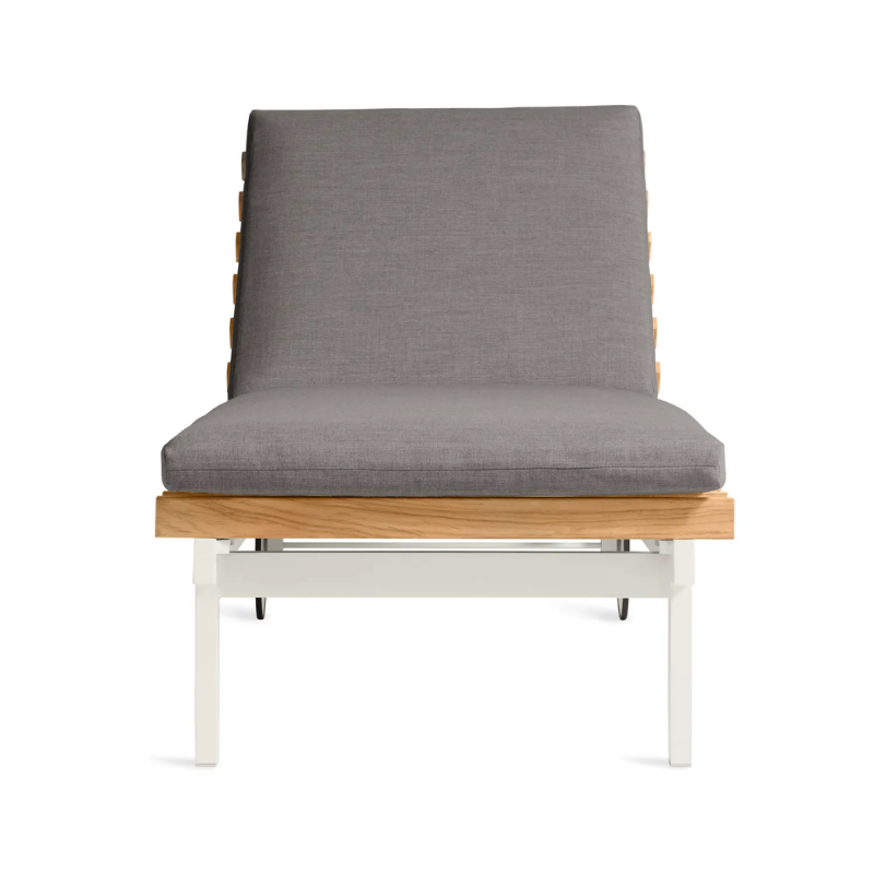 The Perch Outdoor Sun Lounger from Blu Dot with the white frame and toohey charcoal upholstery from the front.
