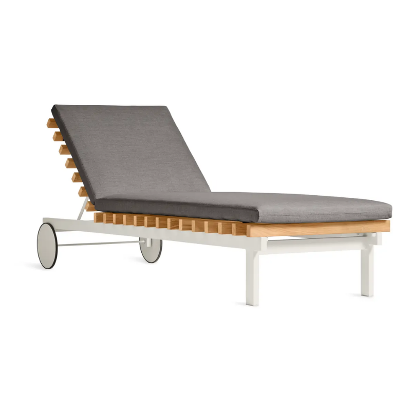 The Perch Outdoor Sun Lounger from Blu Dot with the white frame and toohey charcoal upholstery.