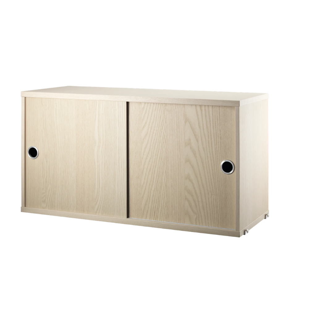 The Cabinet with Sliding Doors from String Furniture in the 11.8 inch depth size and ash color.
