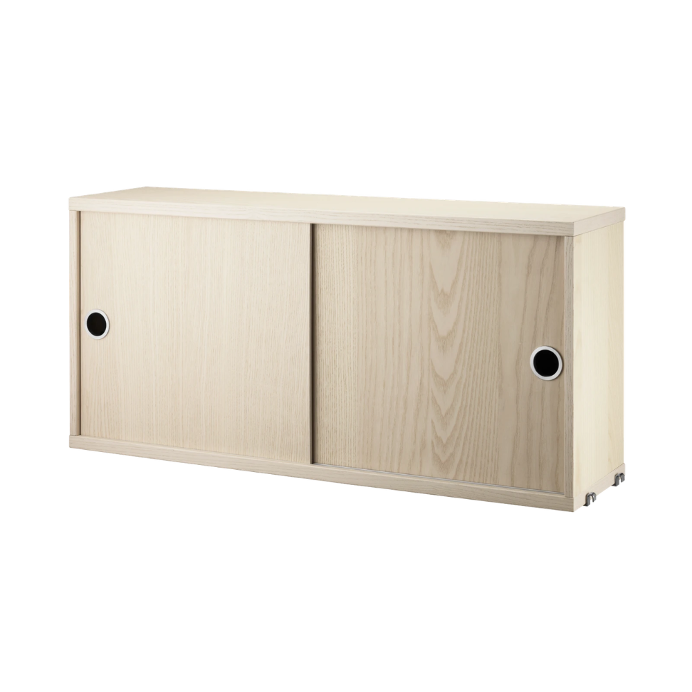 The Cabinet with Sliding Doors from String Furniture in the 7.8 inch depth size and ash color.