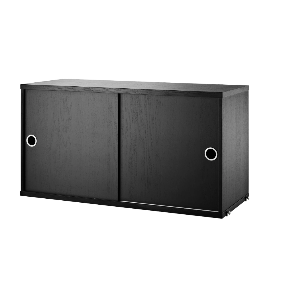 The Cabinet with Sliding Doors from String Furniture in the 11.8 inch depth size and black stained ash color.