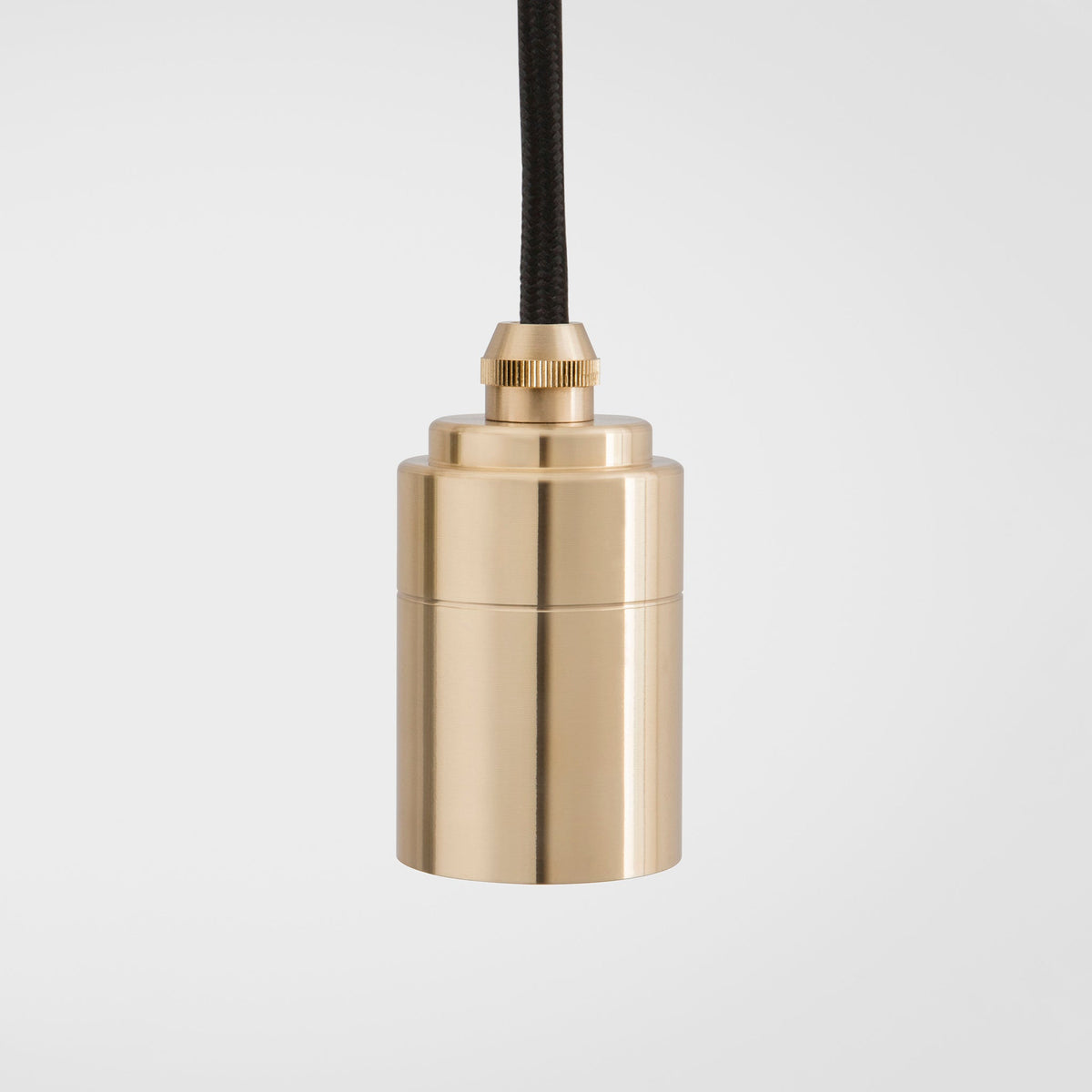 The brass detailing of the Triple Pendant in Brass + Sphere IV by Tala US. all-groups