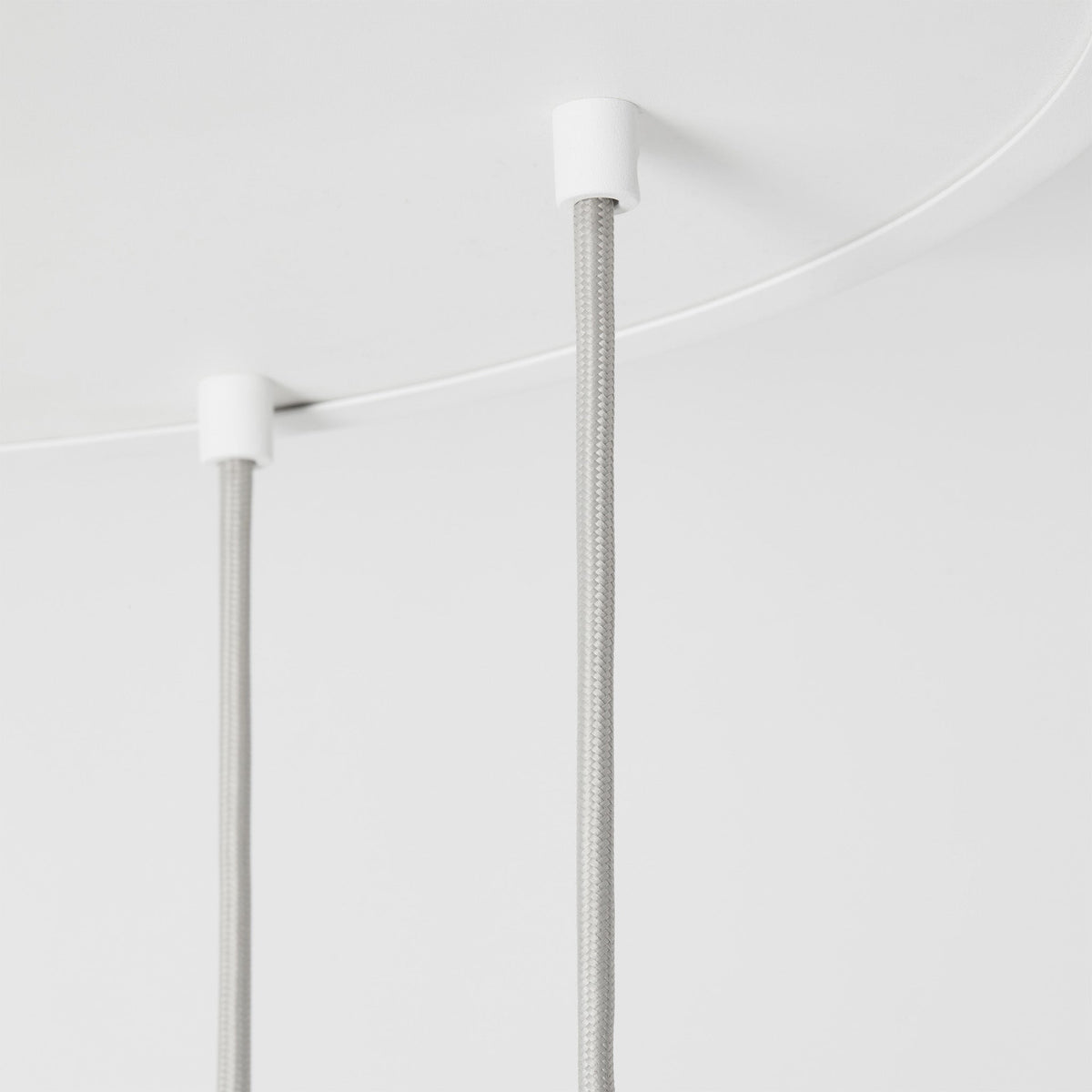 Canopy detail of the Alumina Nine Pendant with Sphere V bulbs by Tala Lighting.