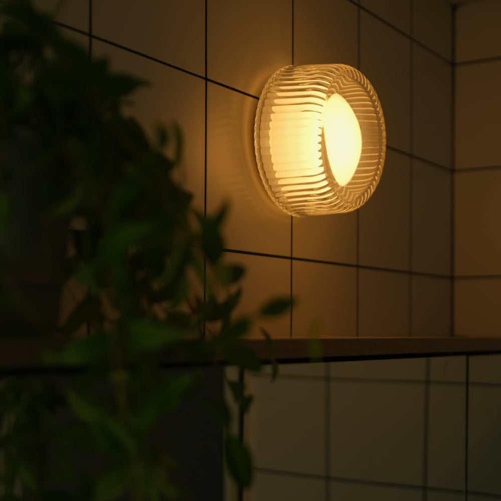The Firth Wall Light by Tala Lighting in bathroom.