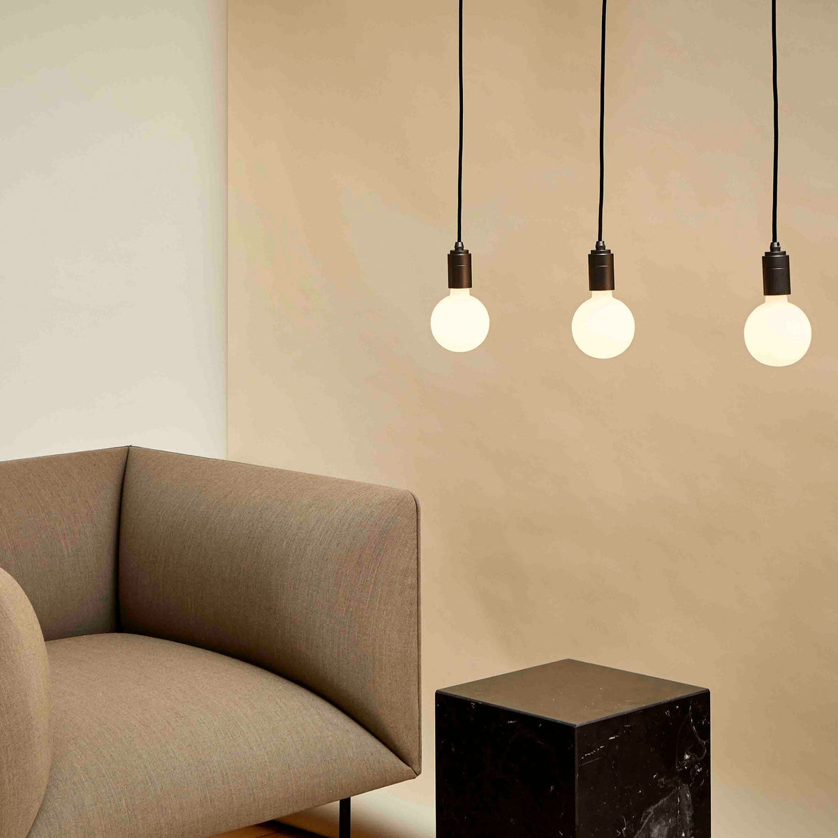 The Sphere III E26 Dim-to-Warm LED Bulb by Tala Lighting in a living room.