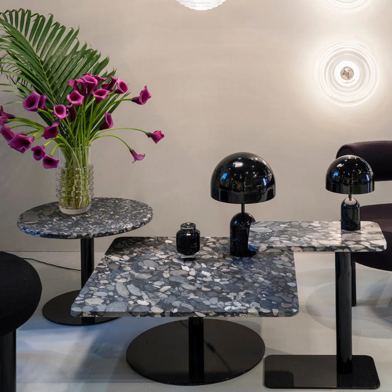 The Bell Portable LED from Tom Dixon in black in a display room.