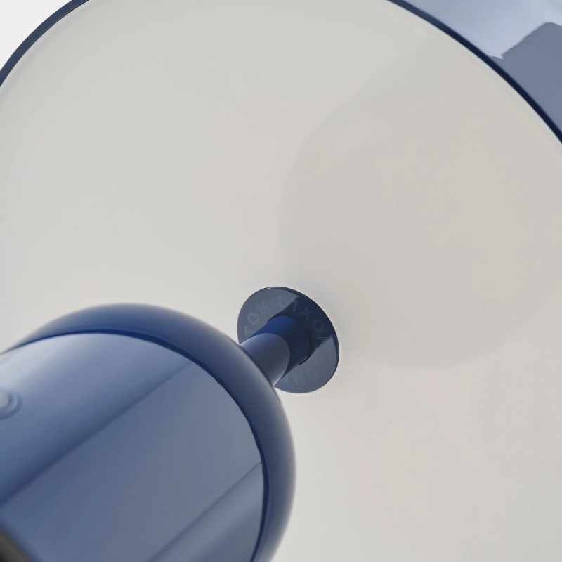 The Bell Portable LED from Tom Dixon in indigo close up.