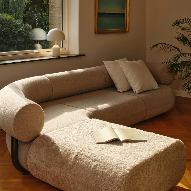 The Bell Portable LED from Tom Dixon in putty in a family area.