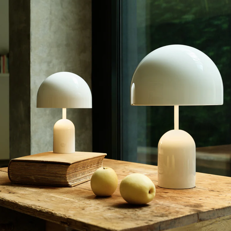 The Bell Portable LED from Tom Dixon in putty in a family room.