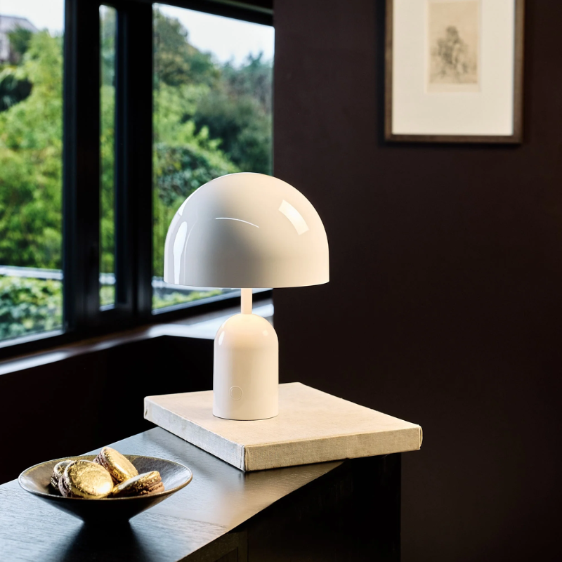 The Bell Portable LED from Tom Dixon in white in a home office.