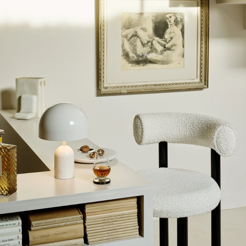 The Bell Portable LED from Tom Dixon in white in a kitchen area.