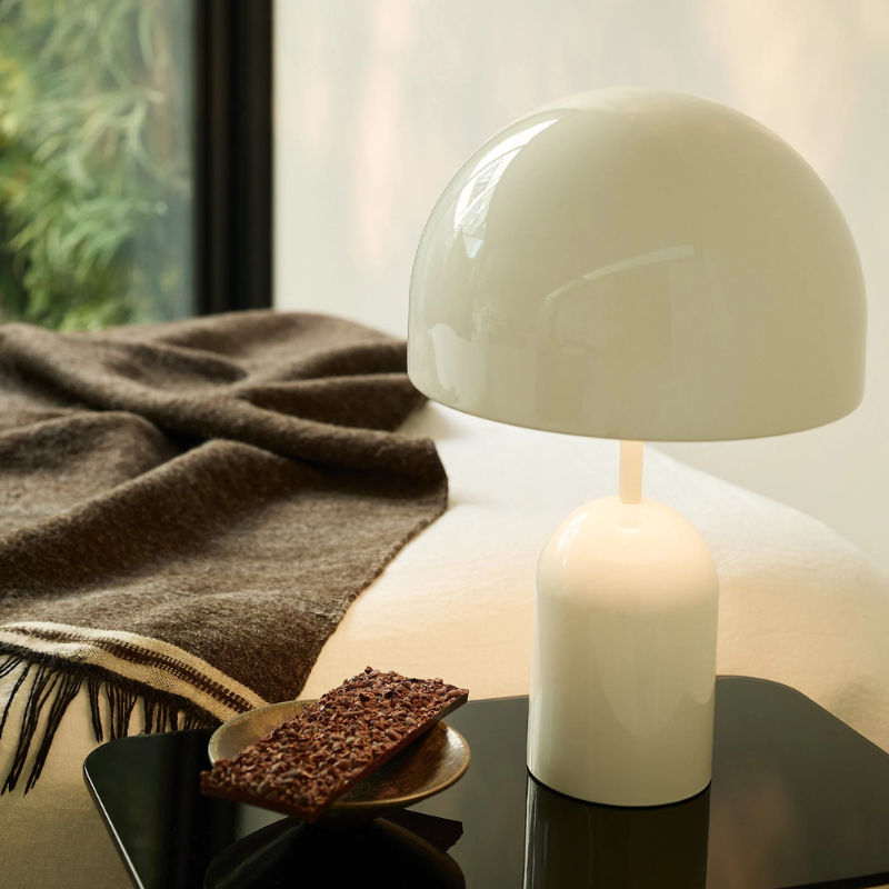 The Bell Portable LED from Tom Dixon in white in a livng space.