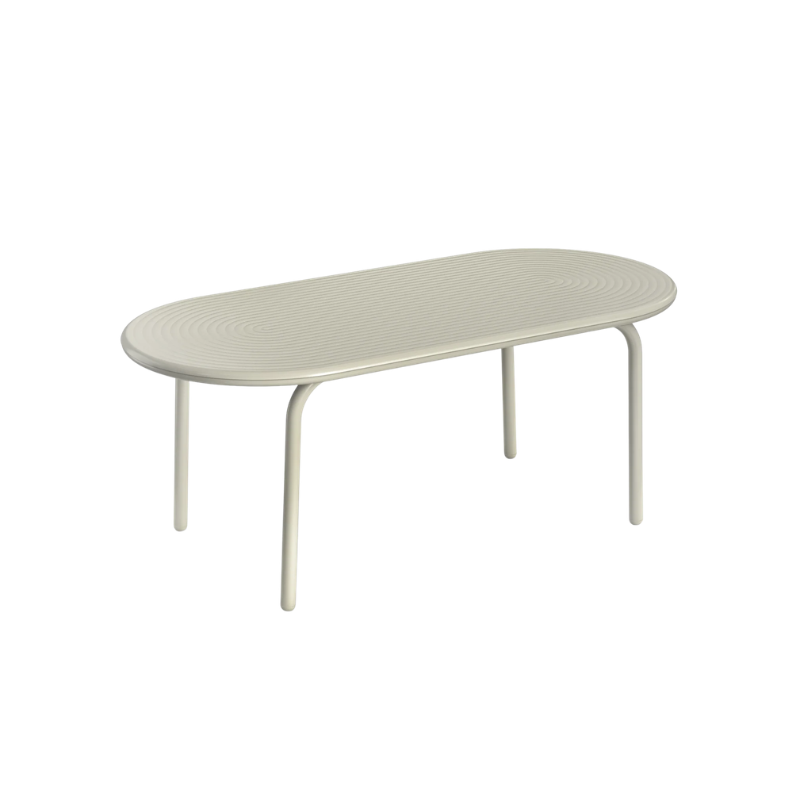 Groove Large Oval Outdoor Table in Putty by Tom Dixon.