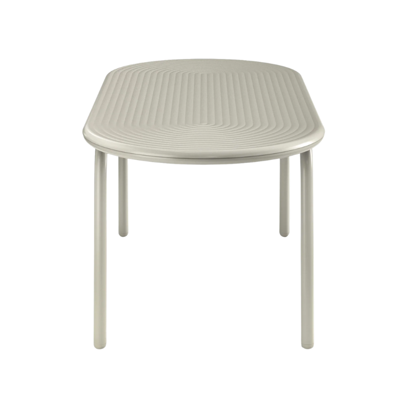 Groove Large Oval Outdoor Table in Putty by Tom Dixon from the side.