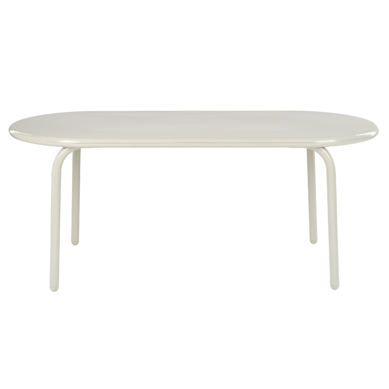 Groove Large Oval Outdoor Table in Putty by Tom Dixon from the side.