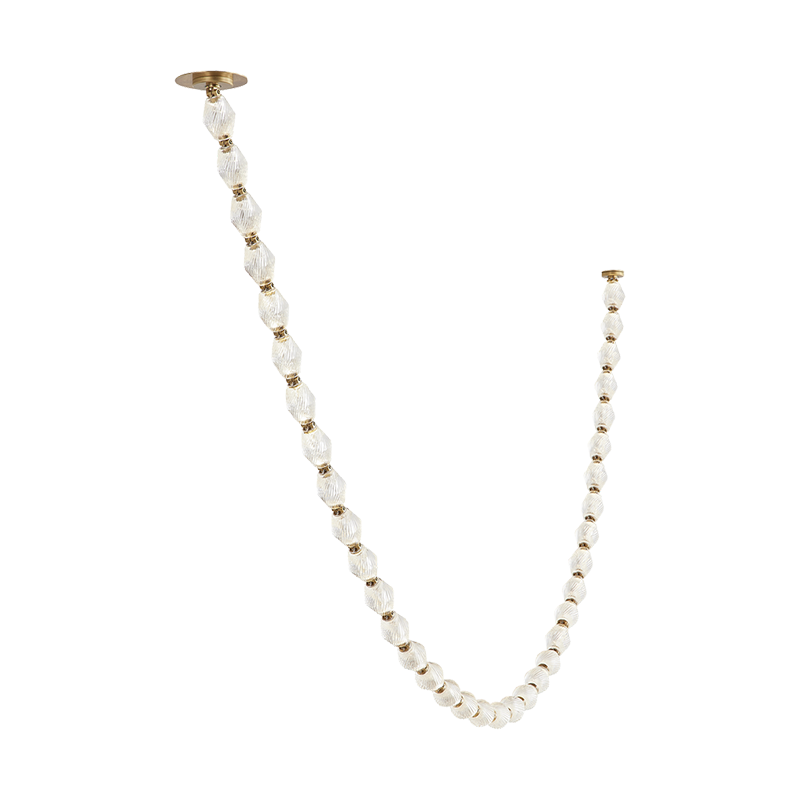 The Collier 108 Chandelier from Visual Comfort and Co in natural brass.