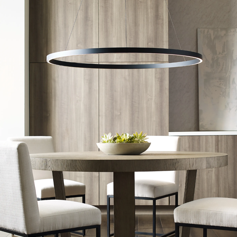 The Fiama Suspension Light from Visual Comfort and Co. in a dining room.
