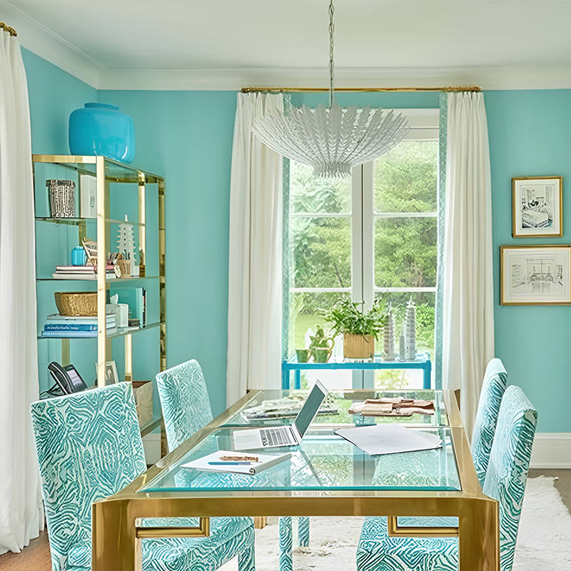The Hampton Medium Chandelier from Visual Comfort and Co in plaster white in a dining space.