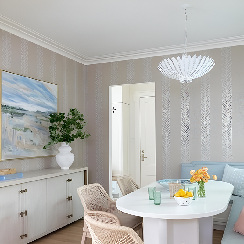 The Hampton Medium Chandelier from Visual Comfort and Co in plaster white in a living room.