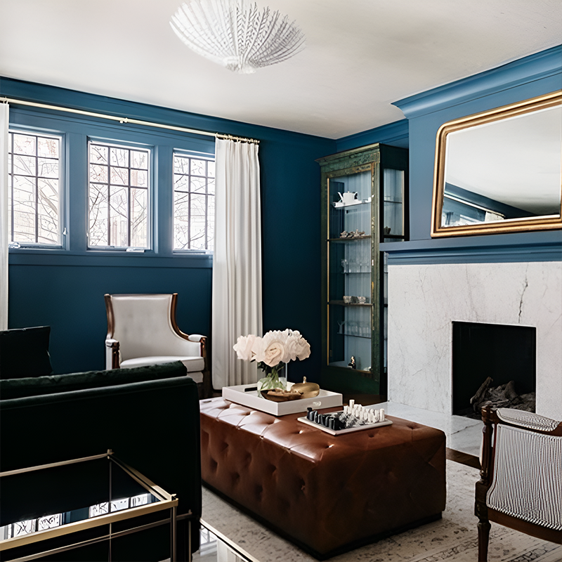 The Hampton Mini Chandelier from Visual Comfort and Co in plaster white in a living room.