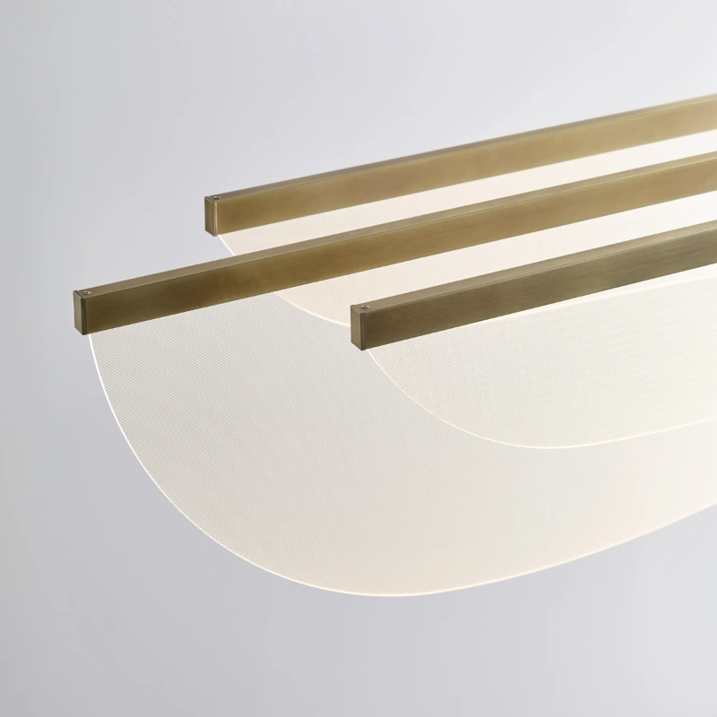 The Nyra Linear Suspension from Visual Comfort and Co in a lounge.