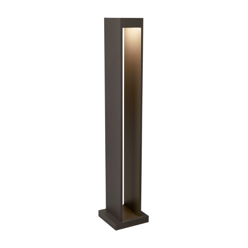 A modern outdoor bollard path light with a black finish and a visible LED light panel at the top from Visual Comfort and Co.