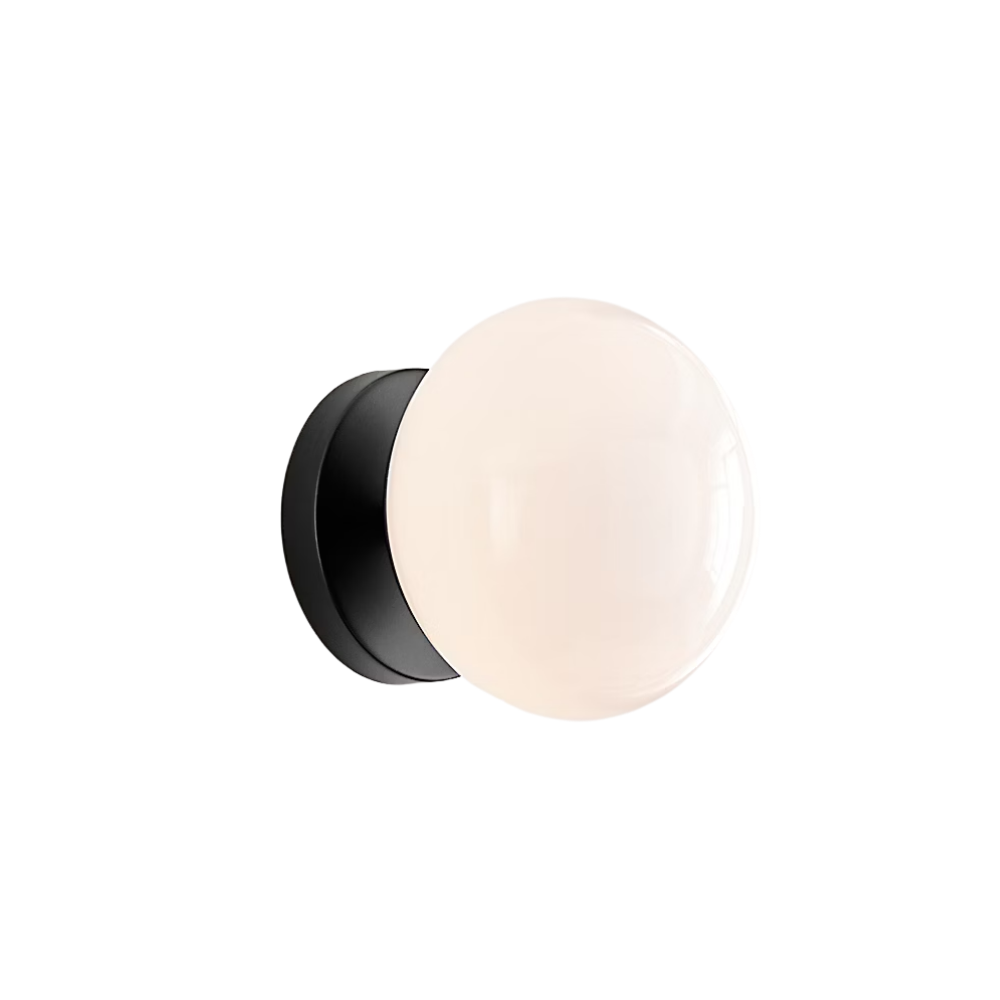 The Lune 1-Light Bath Sconce from Visual Comfort & Co in Aged Iron turned on.