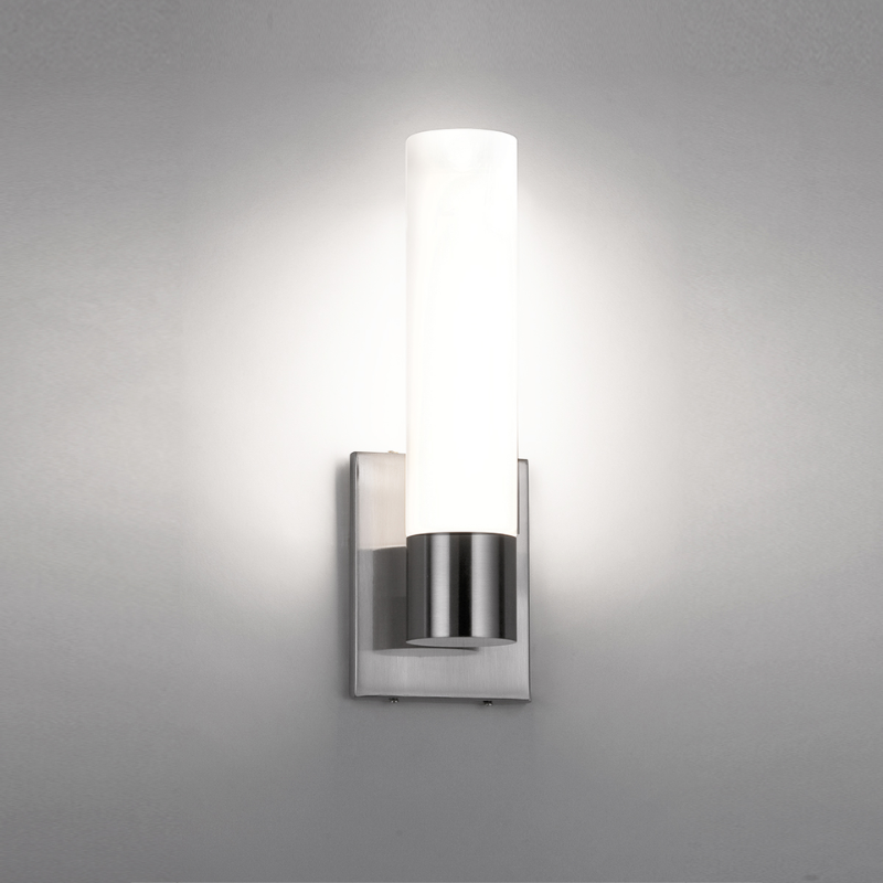 The Elementum Wall Sconce from WAC Lighting in a bathroom.