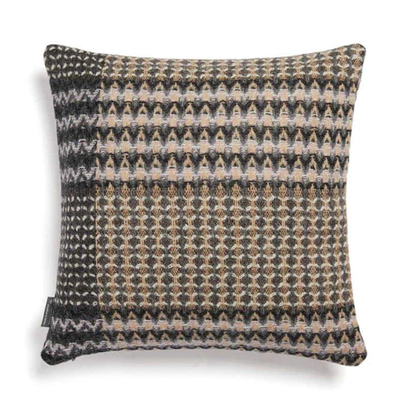 The Ansel Cushion by Wallace & Sewell is made of 100% shetland wool. Grey accent throw pillow.