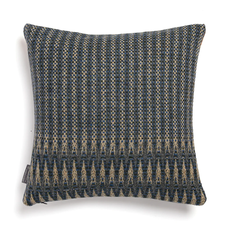 The Cairngorm Shetland Tweed Cushion is a textured pillow with beige and blue pattern.