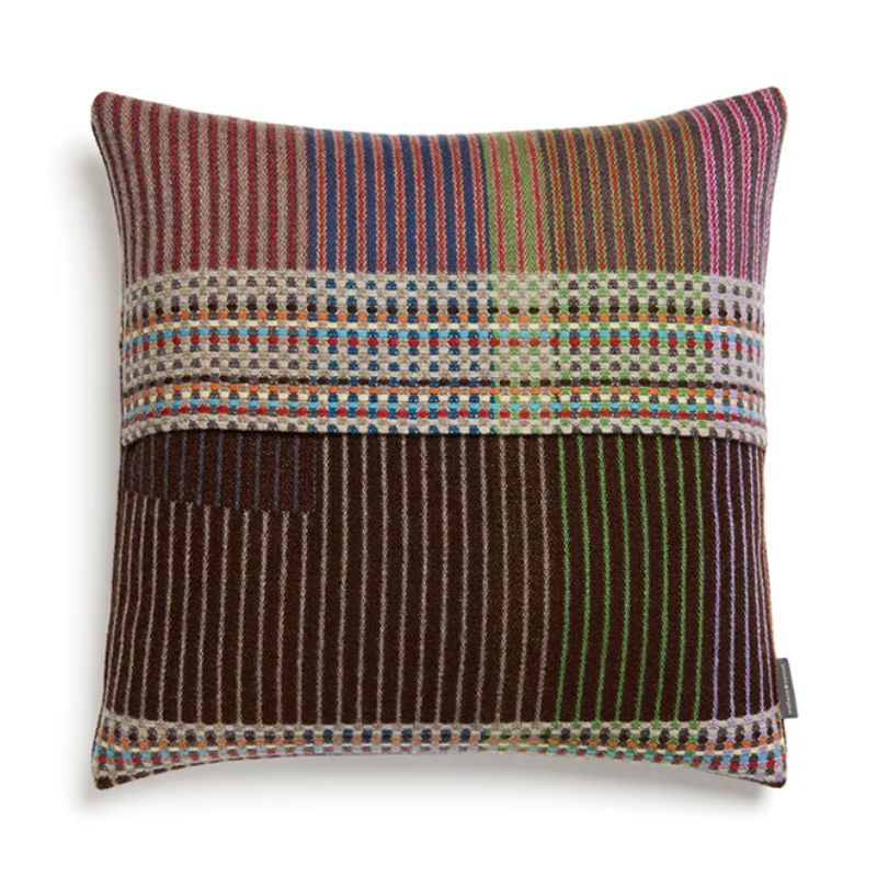 Wallace & Sewell's Pinstripe Sophia cushions feature detailed vertical stripes within areas of bold playful colors like brown, green, and ecru.