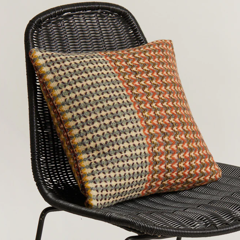 The Yosemite Cushion by Wallace & Sewell on a chair.