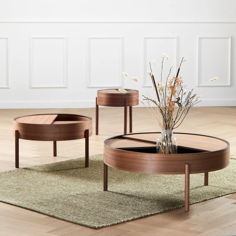 The ARC Coffee Table from Woud in walnut size options.