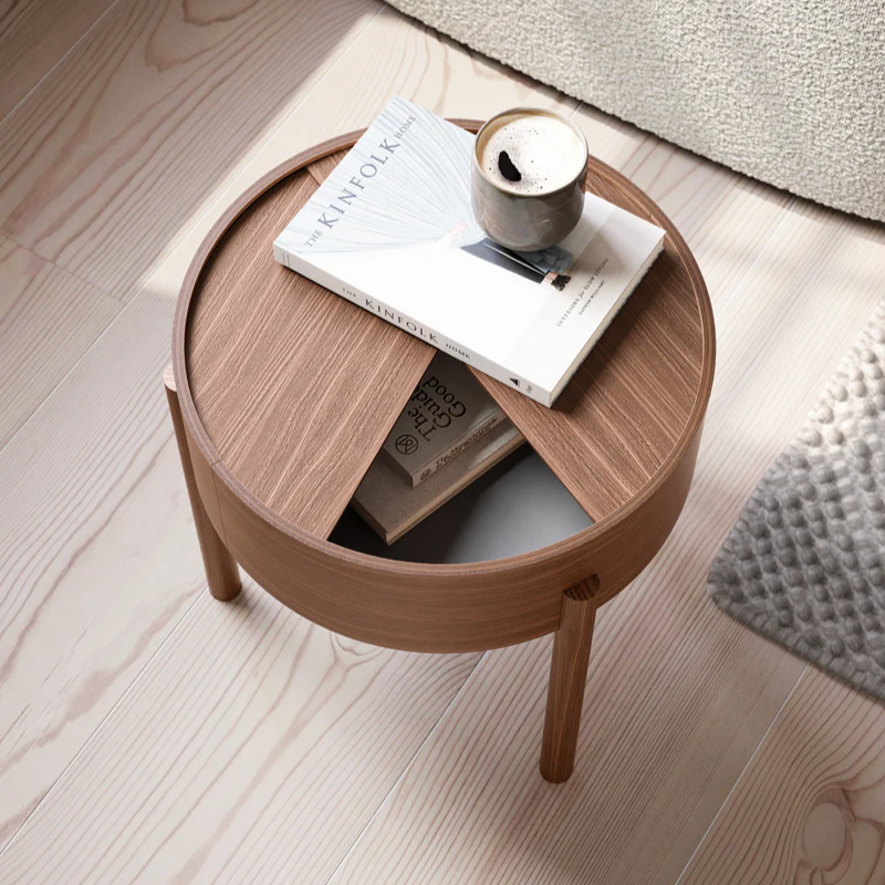 The ARC Side Table from Woud in walnut feautring the wood furniture.