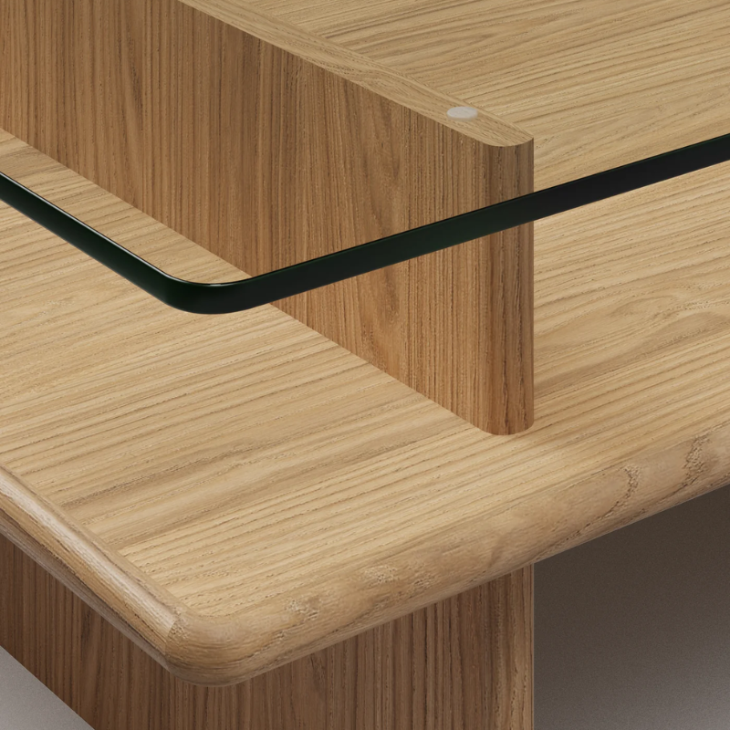 The Parallel Coffee Table from Woud made with oak and a glass top in detail.