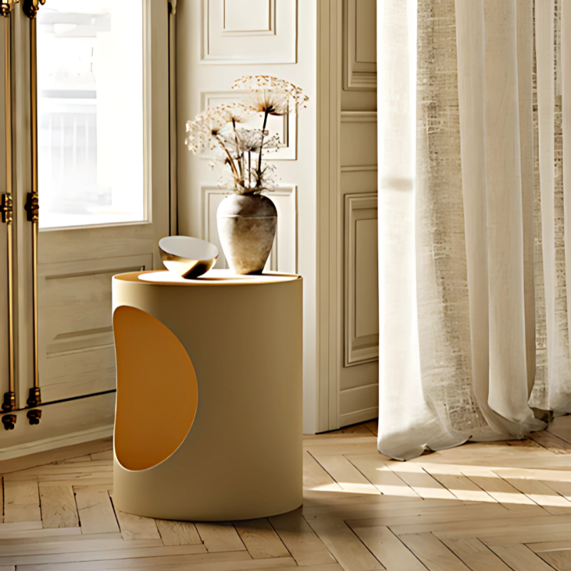 The TABL Side Table from Woud in ivory in a family area.