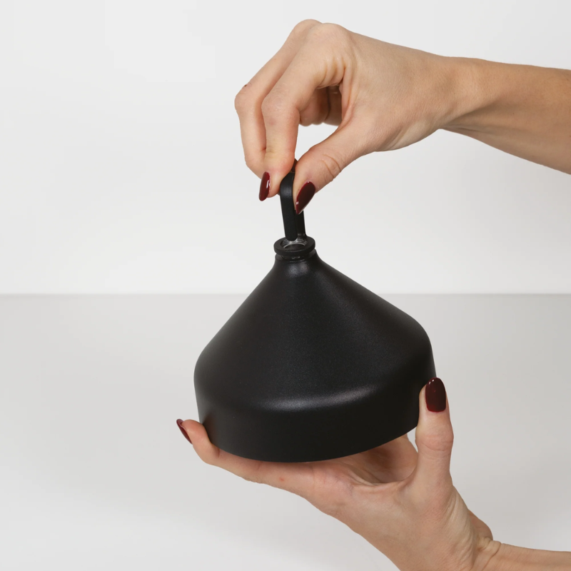 The black Amelie Pro Hanging Lamp from Zafferano showcasing the hanging hook.