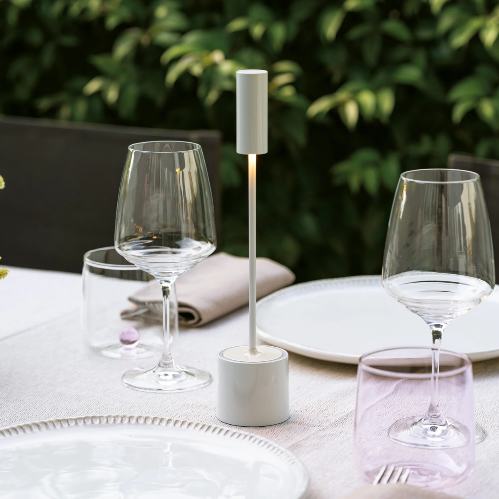 The pearl white Carolina Pro from Zafferano in an outdoor dining space.