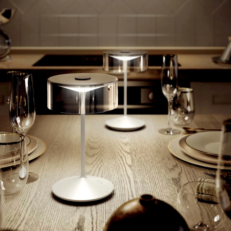 The white with smoke glass Crystal from Zafferano in a dining room.