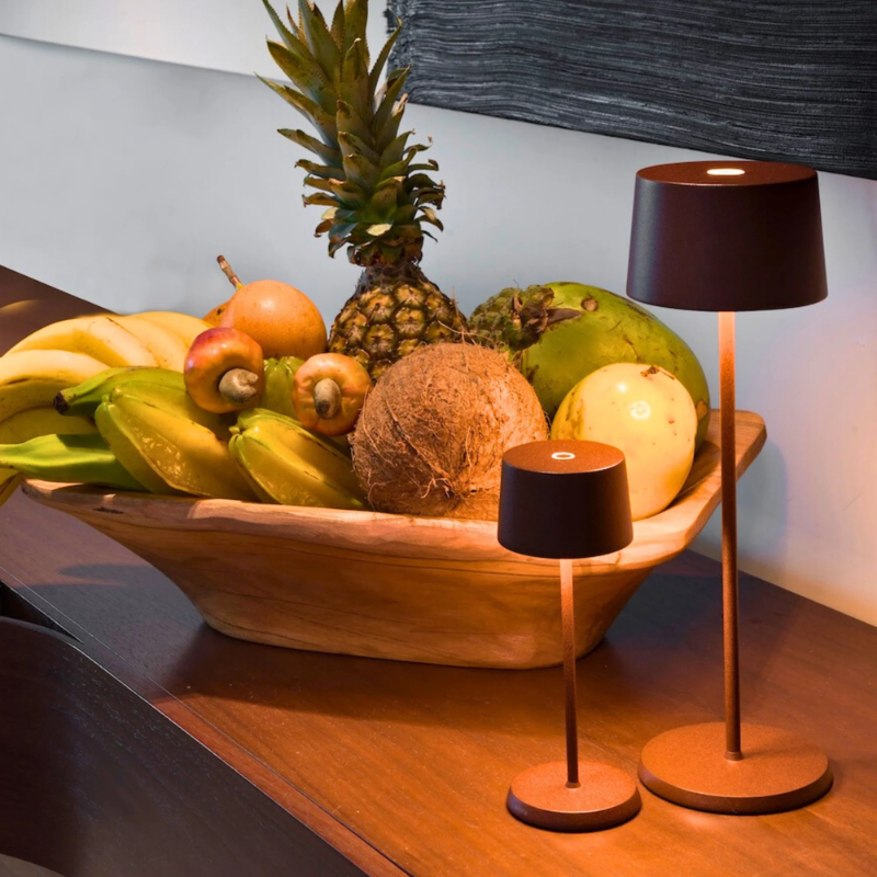 The rust Olivia Pro Micro from Zafferano in a dining room.