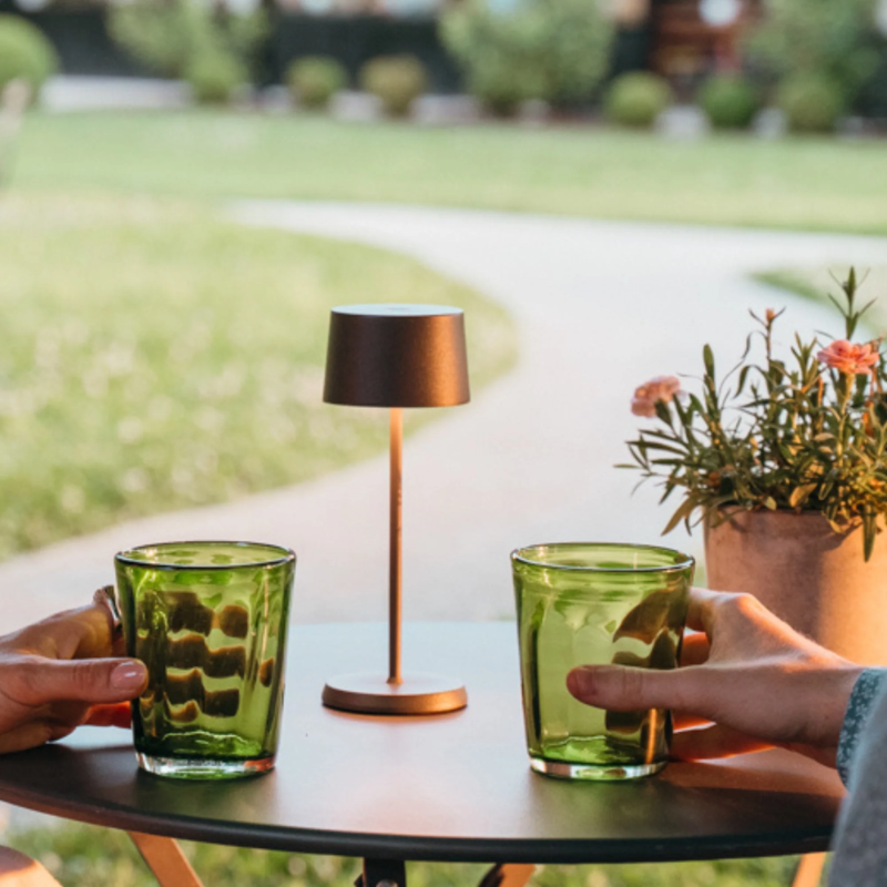 The rust Olivia Pro Micro from Zafferano in an outdoor lounge.