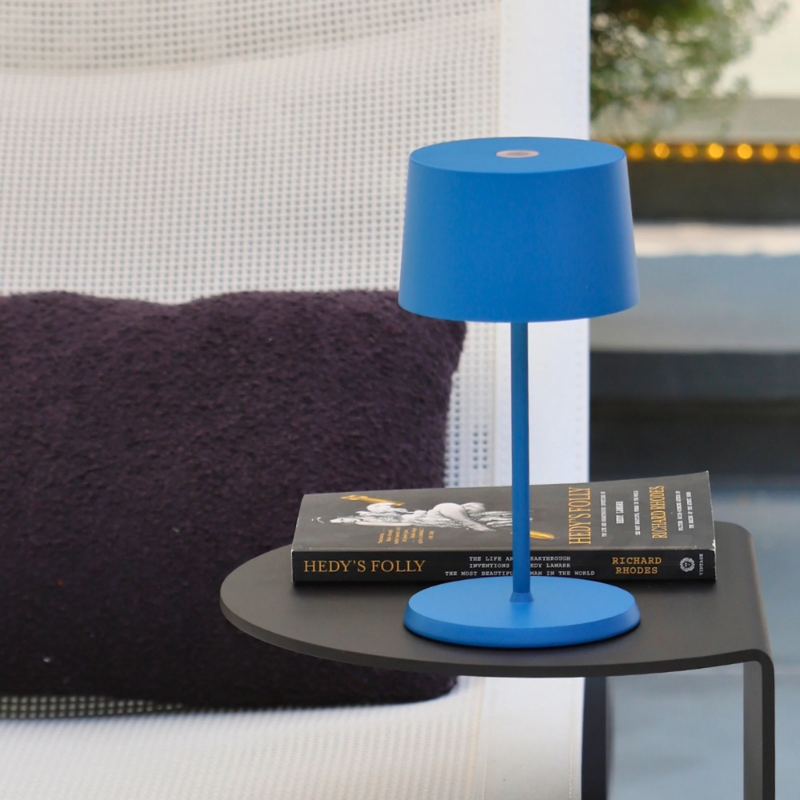 The capri blue Olivia Pro Mini from Zafferano in a living room.