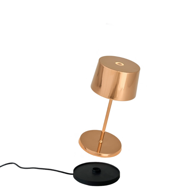 The rose gold Olivia Pro Mini from Zafferano, a cordless lamp.