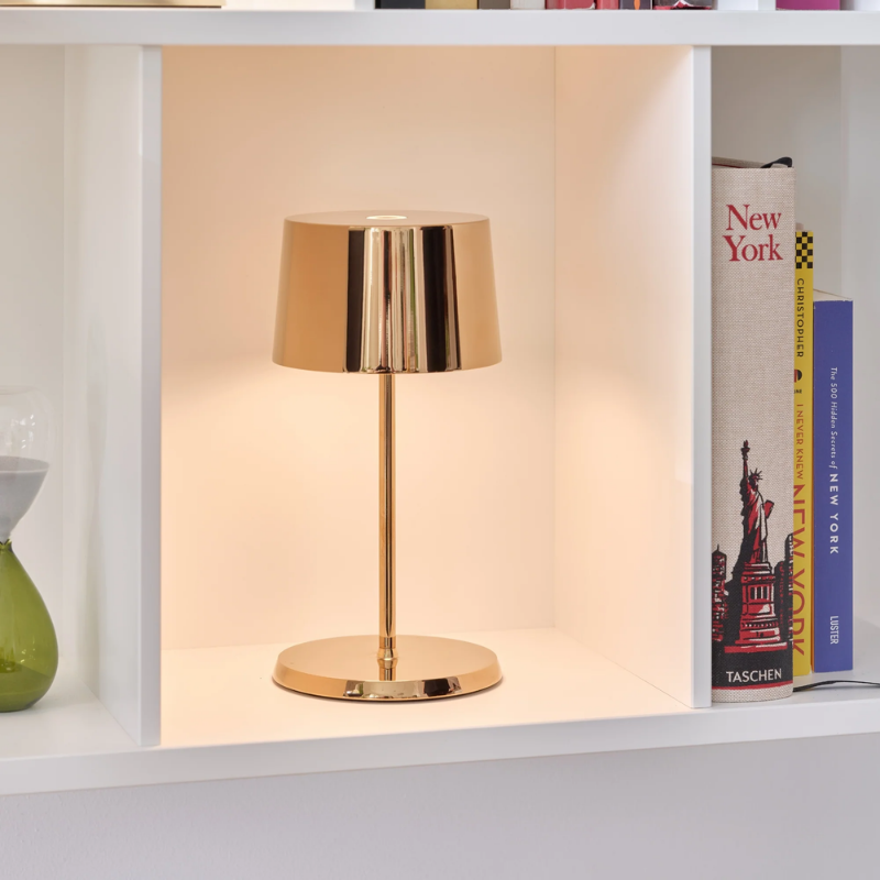 The rose gold Olivia Pro Mini from Zafferano in a study.