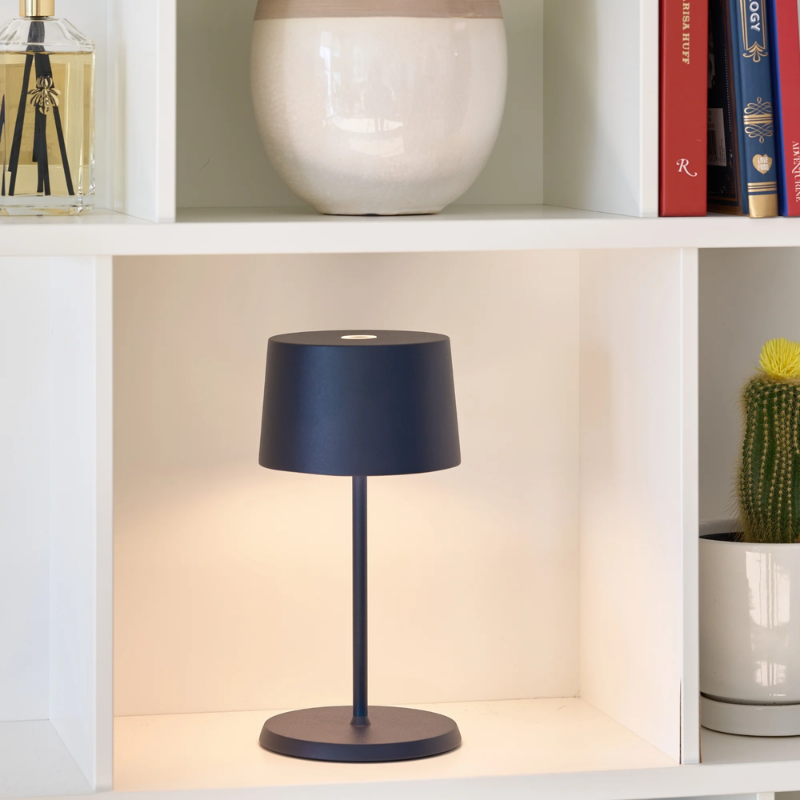 The steel blue Olivia Pro Mini from Zafferano in a business office.